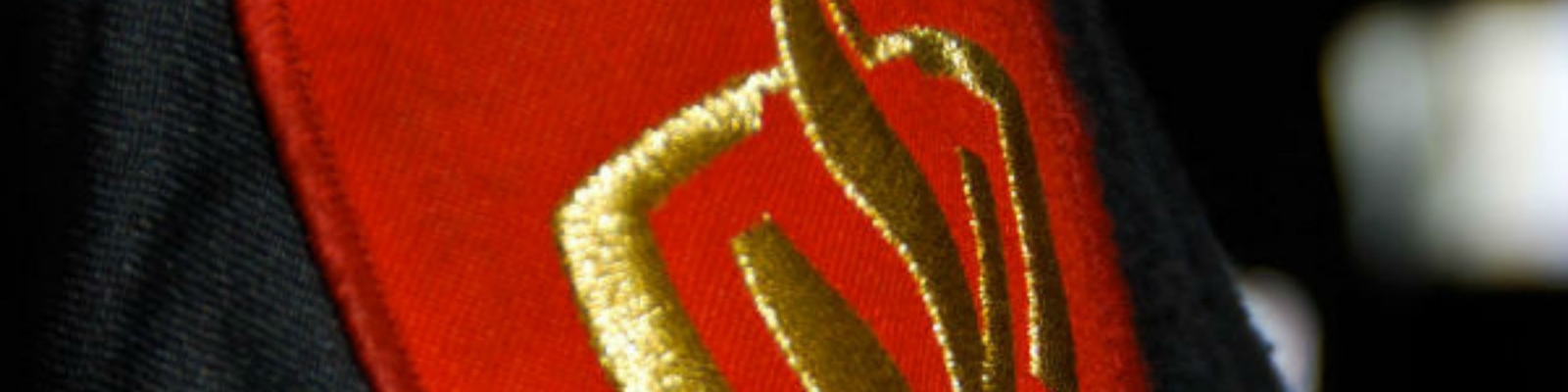 Brandweer logo op uniform